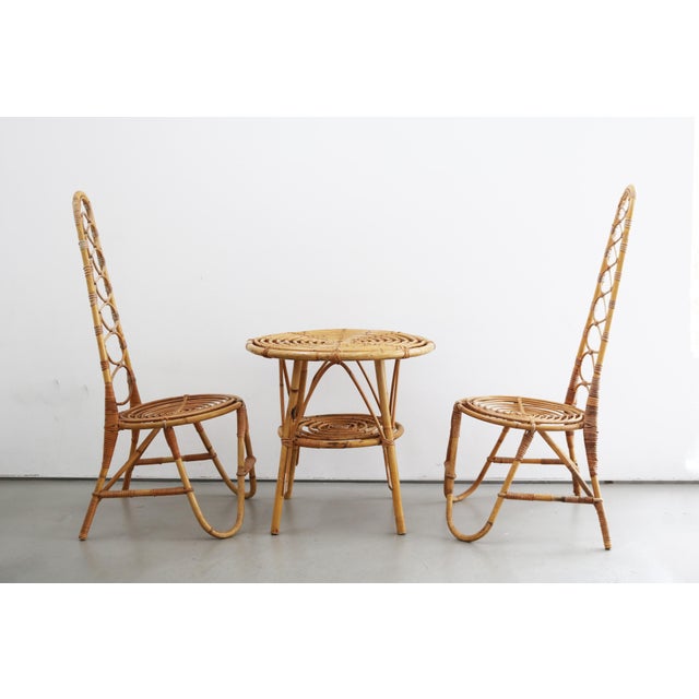 Mid-century modern bamboo - 2 chairs with side table Beautifully designed with attention to detail Made in Italy, 1960s...