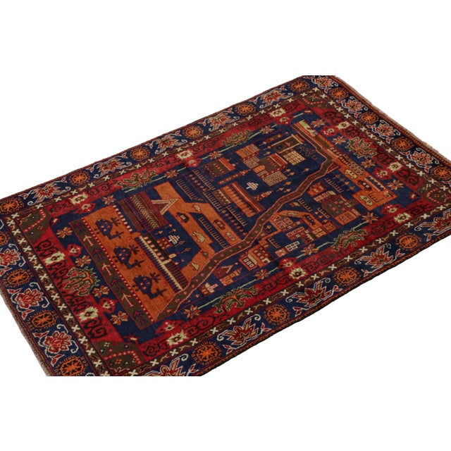 Hand-knotted in wool and goat hair, this 4x6 vintage Baluch rug is an extremely rare and collectible pictorial design from...