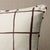 This pillow features Painterly Windowpane by Miles Redd for Schumacher with a self welt finish. Charmingly wonky and drawn...