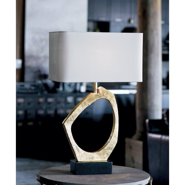 The Manhattan Table Lamp doubles as a sculptural art piece—a cool juxtaposition of organic shape and refined metal. This...