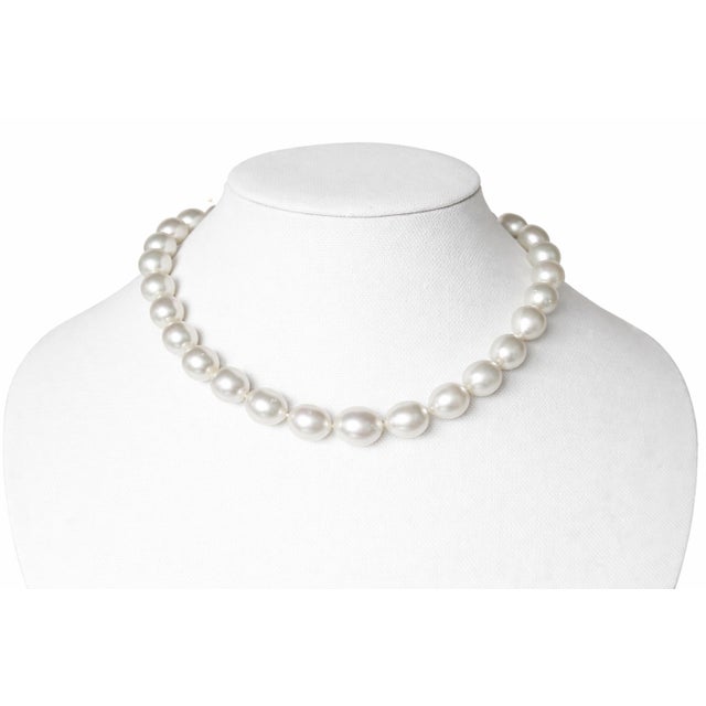 This exquisite necklace is made up of carefully selected white saltwater pearls of a rare pear shape. Each pearl, ranging...