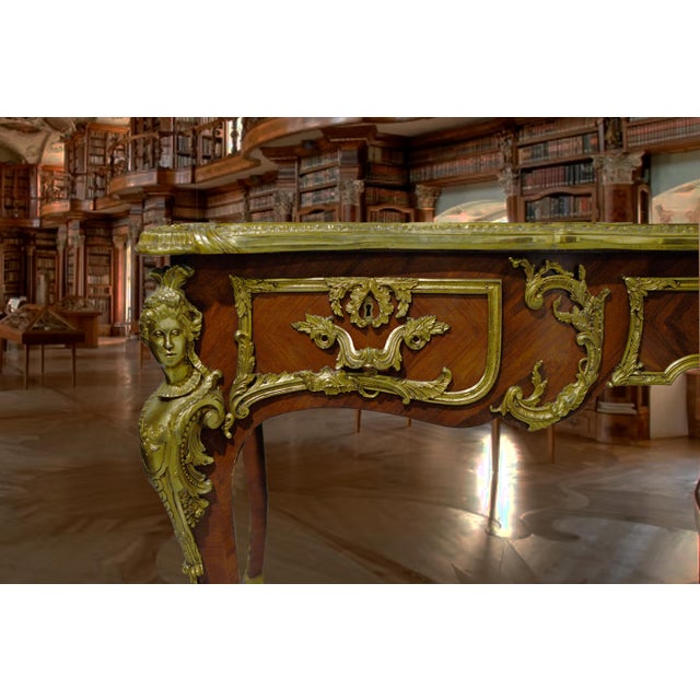 Create an outstanding office with this monumental fine&nbsp;french Louis antique bureau plat writing desk. Crafted in...