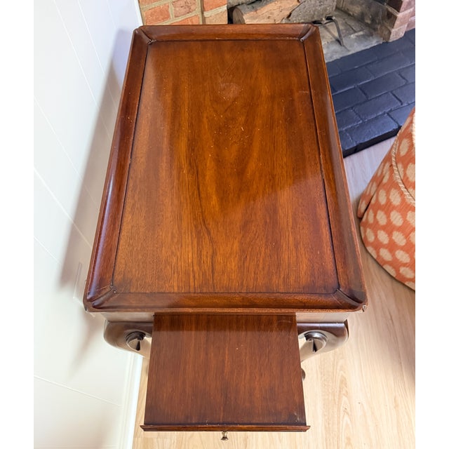 Henkel Harris Tea Table Two pull out side trays, a scalloped apron and Queen Anne feet. 30” x 19” x 26.5” h