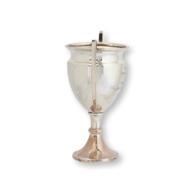 English silverplate trophy engraved for the 1954 Sunbeam Point to Point Senior Race First Class Award. Presented during...