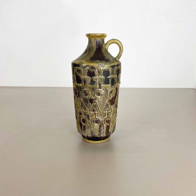 Original vintage 1960s pottery ceramic vase in Germany. High quality German production with a nice abstract coloration....