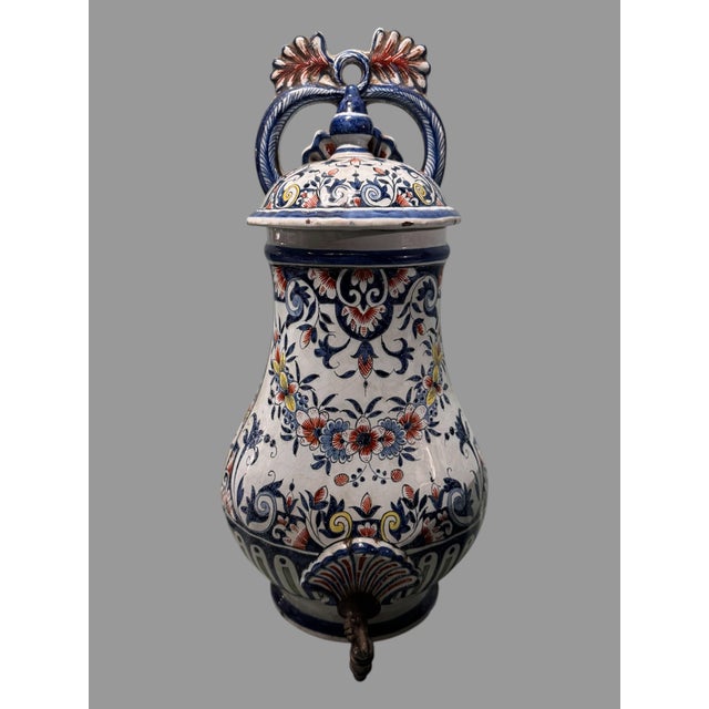 Antique French Faience Floral Polychrome Decorated Lavabo Wall Fountain In good original condition showing some typical...