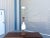 Mid-Century Modern Tall Sculptural Walnut & Ceramic Table Lamp designed and manufactured in the United States, circa...