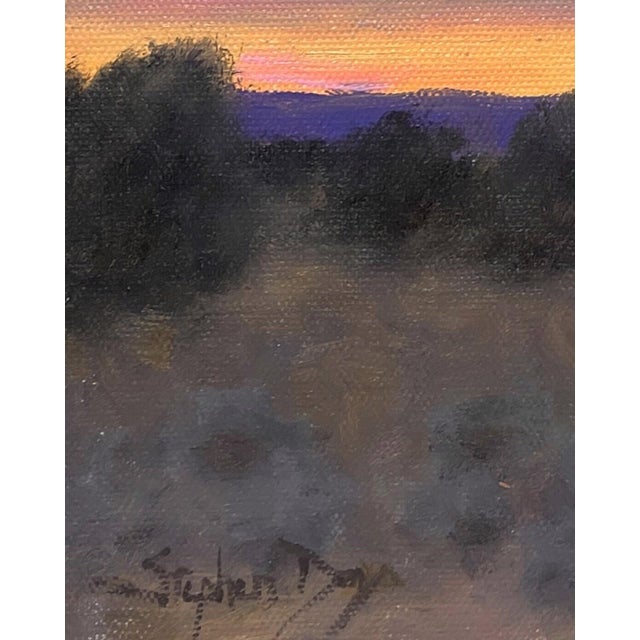 The painting captures a serene evening landscape, where soft hues of pink and orange blend seamlessly into the cool blues...