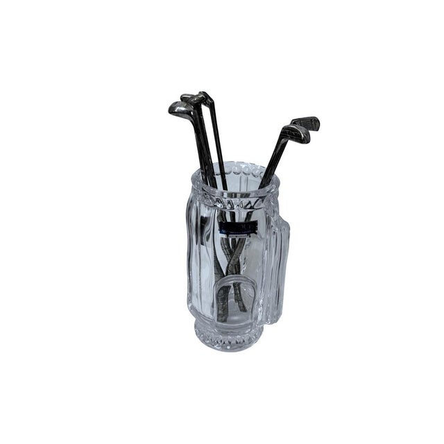 Elegant golf-themed holder with stirrers, ideal for drink mixing or display. Crafted with premium crystal and accented...