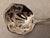 An all-purpose sterling silver sauce ladle by Towle in the "Benjamin Franklin" pattern of a traditional shell design...