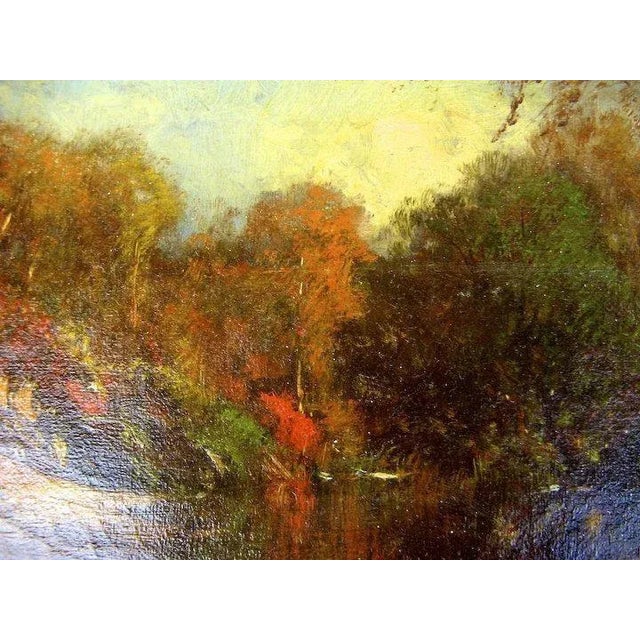 A 944 Autumnal Landscape with river from left foreground to middleground, wooded shores in right foreground and left...