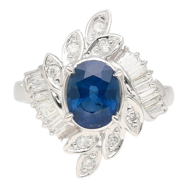 Natural 1.52 Carat Oval Blue Sapphire and Diamond Platinum Floral Ring For Sale