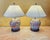 A refined pair of vintage American-made porcelain table lamps showcasing richly detailed, hand-painted floral compositions...