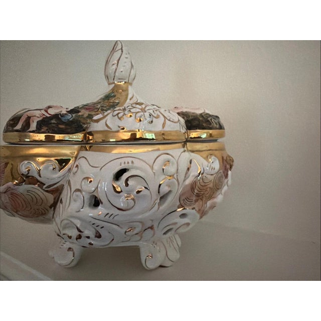 Capodimonte Vintage Bernini Footed Porcelain Bowl Gilded With Cherubs. Condition is Used.