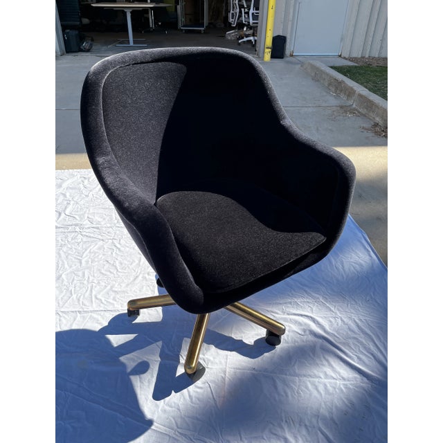 ‘Bumper’ desk chair in black mohair hydraulic mechanism with five prong bronze base, design by Ward Bennett, manufactured...