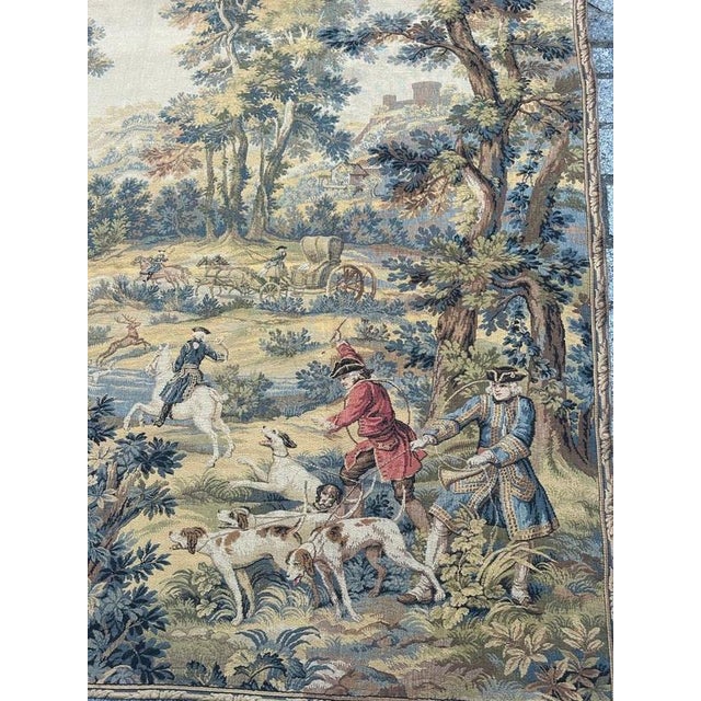 "Discover the timeless elegance of this exquisite vintage French tapestry featuring a hunting with hounds scene. A noble...