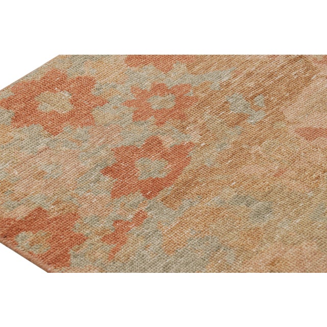 Hand-knotted in wool, this 6x9 modern rug, originating from India, as inspired by modern art with a take on floral...