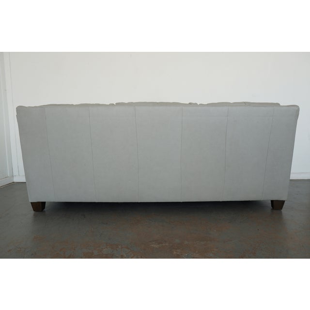 The sloping sock arm of the Ellery Sock Arm Leather Sofa is a gentle nod to the classic origins of this sleek, modern...
