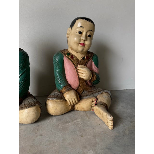 Asian Vintage Asian Hand Carved Wood and Painted Seated Children Sculptures - a Pair For Sale - Image 3 of 12