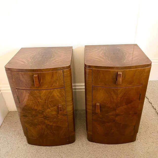 A pair Art Deco Walnut nightstands with Bow front and a top drawer with a enclosed shelf Excellent condition Dimensions:...