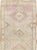 This mid-20th-century Turkish Anatolian runner presents a softly articulated sequence of geometric medallions across a...