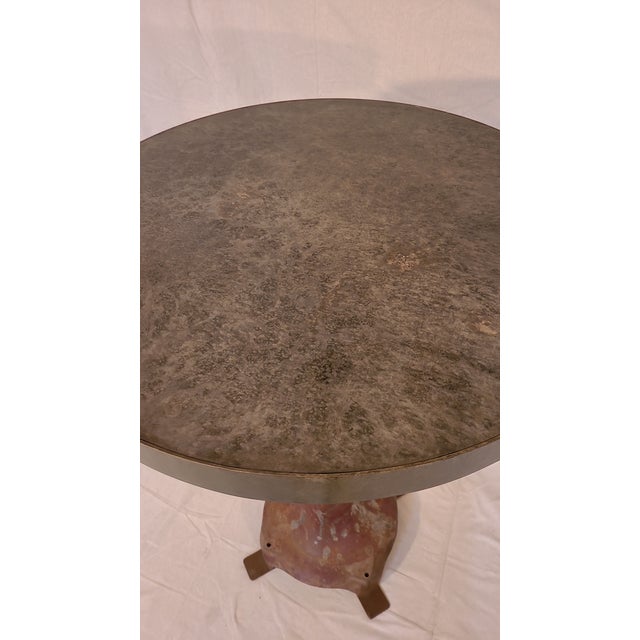 This is a custom made, truly one of a kind, industrial table. The top is steel and has a wonderful pattern and patina, the...