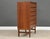 A mid century modern teak tall dresser with inset pulls by Tørring Møbelfabrik. Made in Denmark. Professionally...