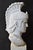 A striking hand-carved solid marble bust of Achilles, the legendary Greek hero of the Trojan War, embodying strength,...