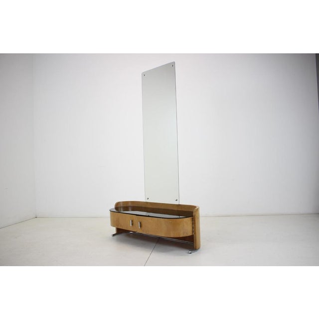 Good original condition - the mirror is new - the black glass is scratched from constant use - beautiful and original piece.