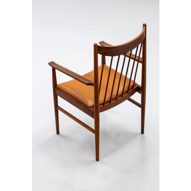 Arm chair designed by Arne Vodder. Produced by Cabinetmaker Helge Sibast in Denmark during the 1960s. Made from rosewood...