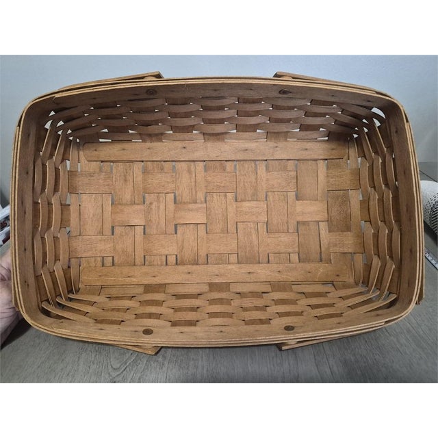 Longaberger Double Swing Handle Large Gathering Basket 16" X 12" Signed 1993 with 2 swing handles. Basket in Vg condition,...