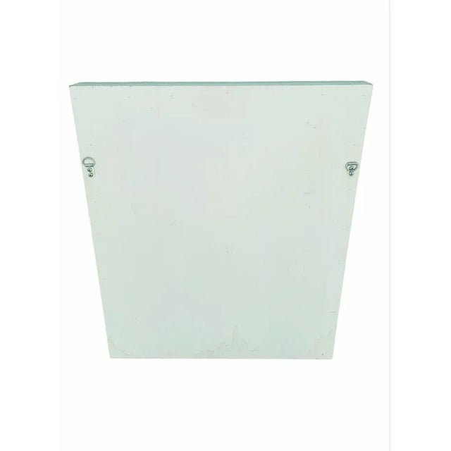 A pair of beautiful distressed seashell framed art prints. The prints are framed in a real wood distressed cream colored...