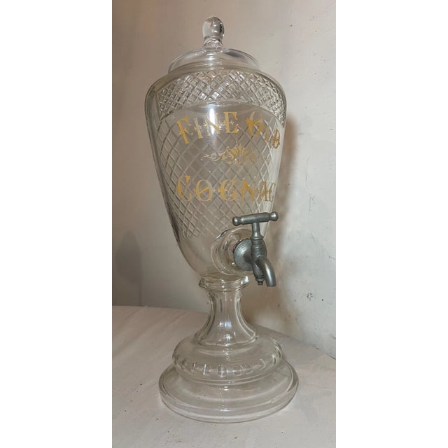 This large antique cut crystal apothecary liquor dispenser is a true gem for collectors. The jar, made by H Turner...