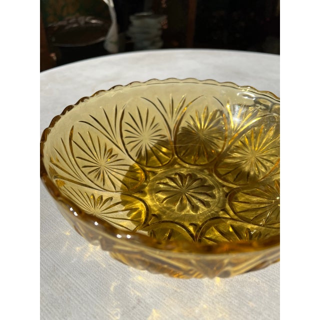 Up for consideration is a beautiful pair of amber colored glass bowls. These would look lovely on display in your home and...