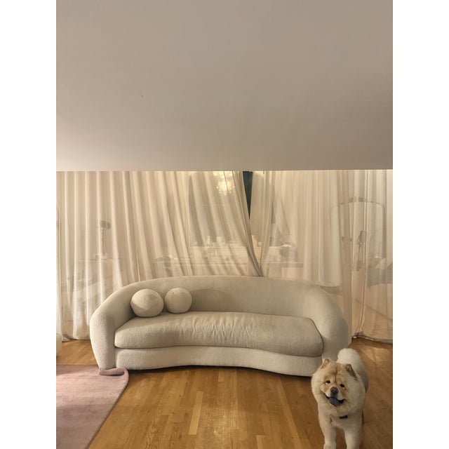 Authentic RH Restoration Hardware Sylvain curved sofa in cream textured upholstery. Sculptural curved design with bench...
