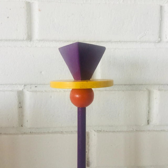 This fun piece inspired by the geometrics of Ettore Sottsass in his Memphis Milano movement, boast bright colors of enamel...