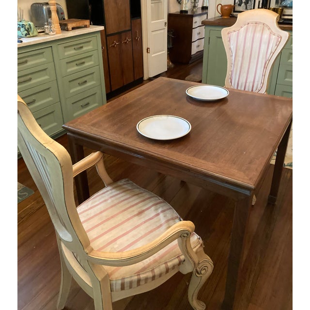 With new upholstery and either a touch up, or a repainting of the frames, this pair of chairs has great potential. Their...