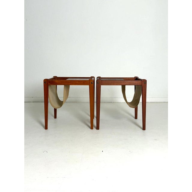 Danish Teak Side Table with Magazine Rack by Furbo Spøttrup, 1960s An elegant Danish side table manufactured by Furbo...