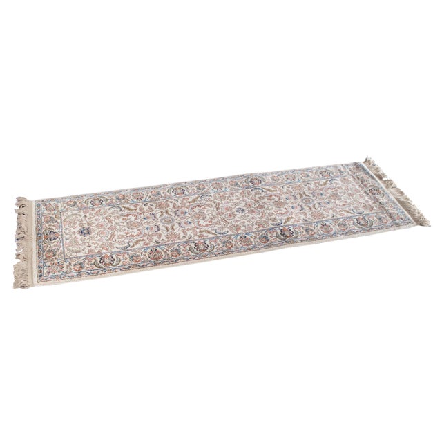 Vintage Karastan 100% wool area rug / mat / carpet featuring a floral motif inspired by palmettes and scrolled vines with...