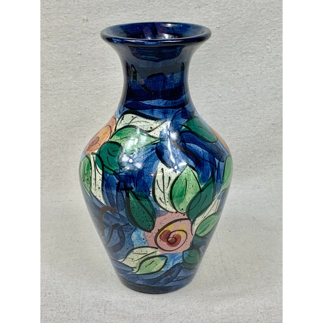 Beautiful vintage hand painted Gail Pittman vase. Floral design with vibrant colors. Perfect to add a pop of color to any...