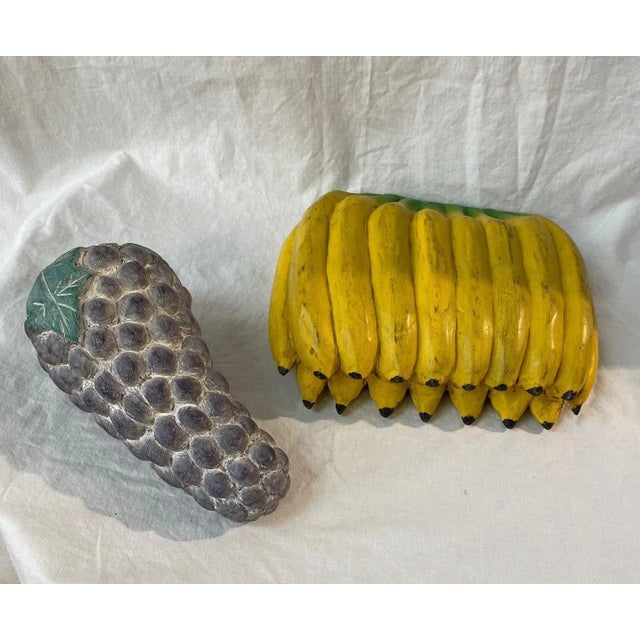 Sarreid Vintage Wood Carved Fruit Bananas and Grapes. 2 separate pieces Showroom Samples Bananas are 10" W 9" D 3" H...