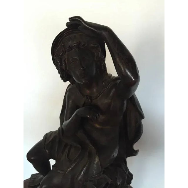 Stunning 19th century rare bronze of seated man figure. The attention to detail is incredible. Having a man looking into...