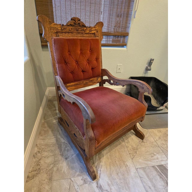 An exceptional late 19th-century American Victorian platform glider rocking chair crafted from beautifully grained quarter...