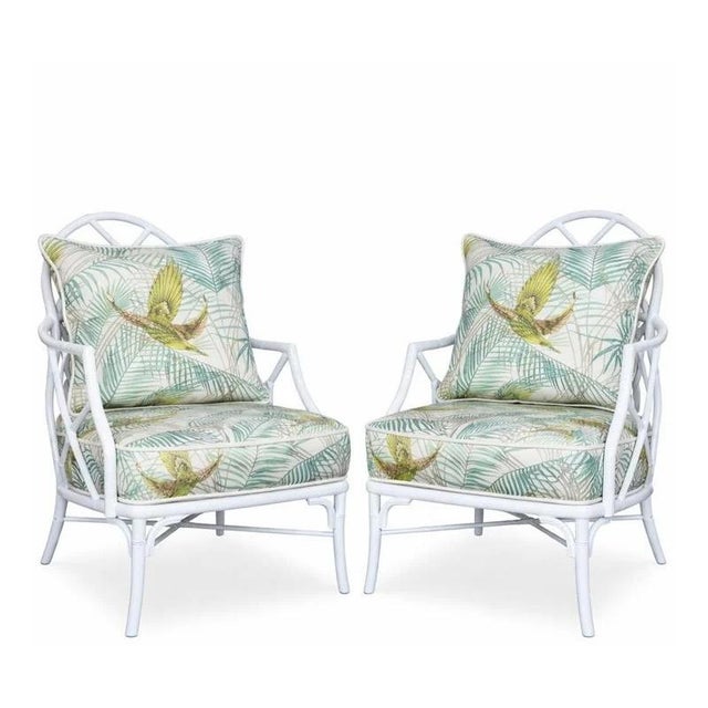 A pair of refined outdoor dining armchairs by Century Furniture, designed with a compact footprint suitable for outdoor...
