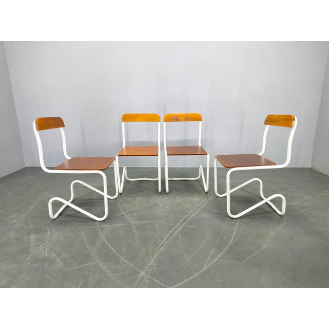 Exceptional set of four Bauhaus cantilever chairs produced in Germany during the 1930s. Featuring a tubular steel frame...
