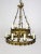 A Mid-Century, Tudor Style, tole chandelier. It has a double ring structure- with 4 lights on the top and 8 on the bottom-...