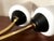 Pair of double wall sconces from the 1950s gilt brass and black metal frame large frosted white glass shades (21 cm) in...