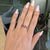Elegant ruby and natural diamond band ring featuring a beautifully balanced design that combines the rich, passionate red...