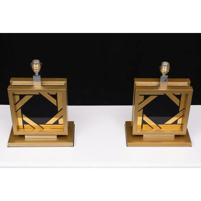 Stunning set of Table lamps. Messing on Black Glass. Chrome on Steel details. Very good quality lamps. 1970s Italy....