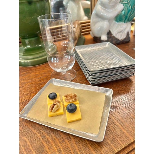 Treat your guests to a vintage hammered aluminum appetizer tray for their small bites…. So easy to juggle with a cocktail....